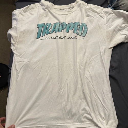 Shirt trapped under ice - under,